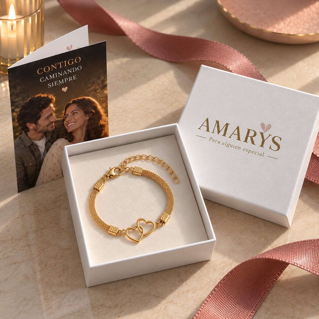Joya en caja AMARYS junto a una tarjeta personalizada
